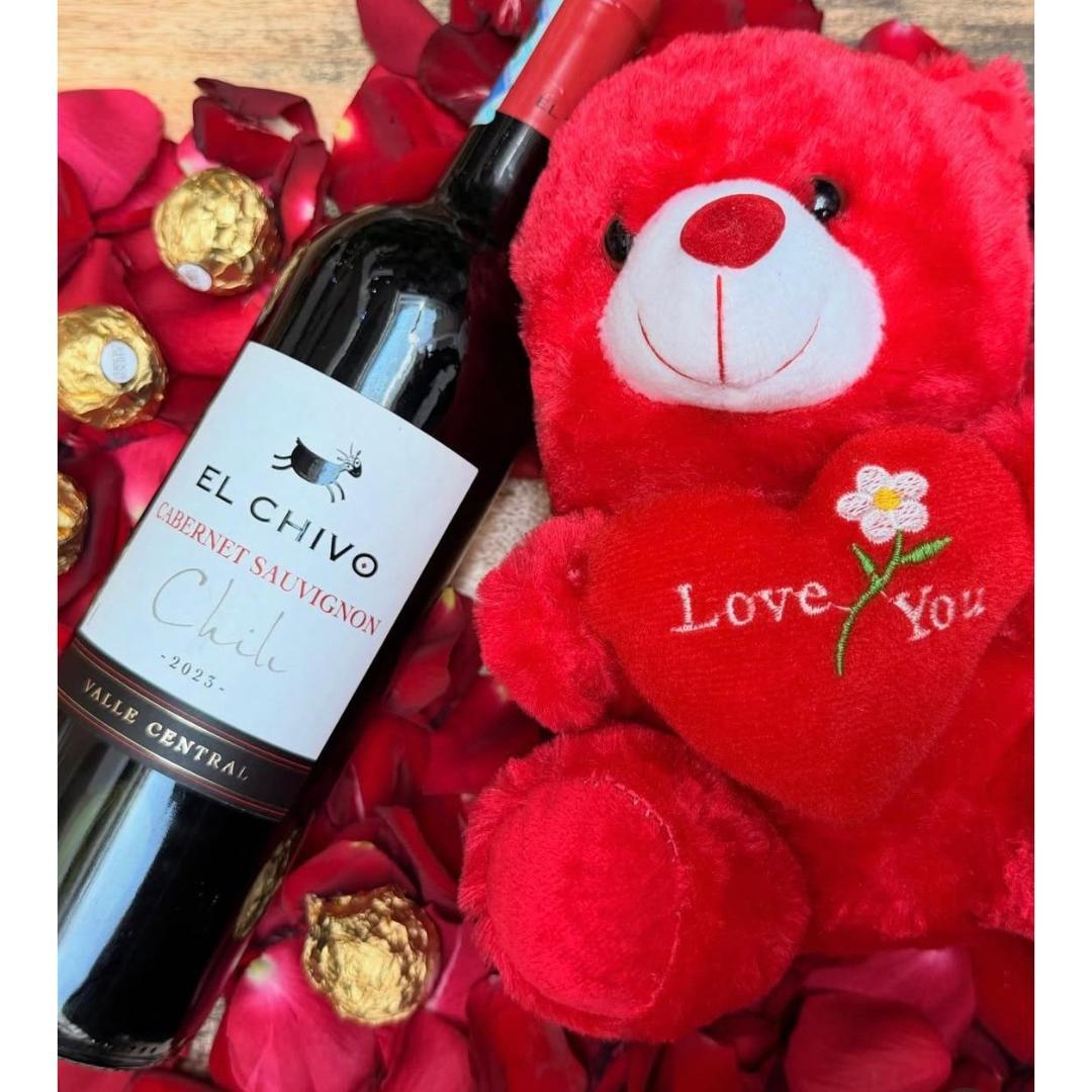 Red wine, teddy bear, and chocolates - a romantic gift hamper in Nairobi by Very Kenyan.