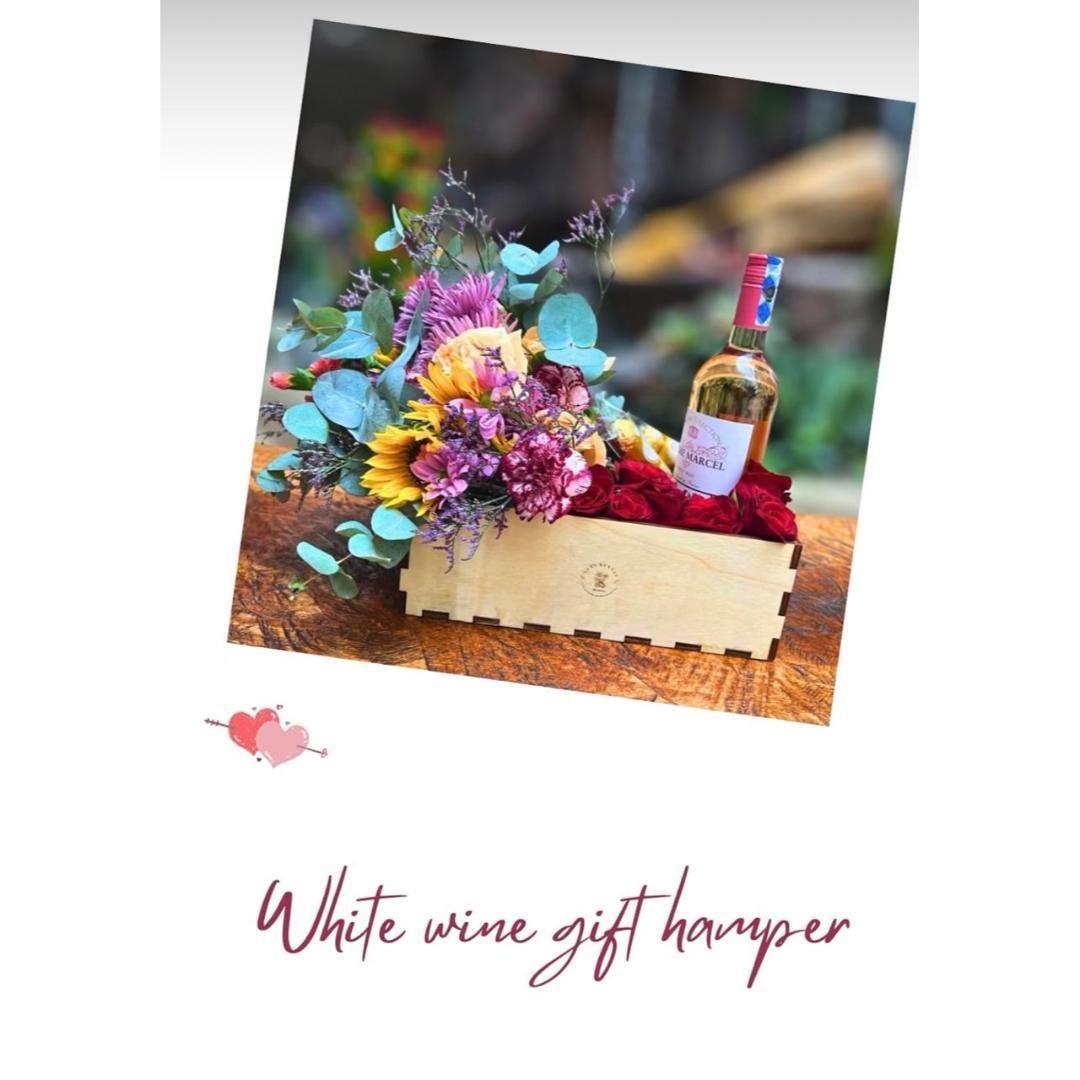 White wine and colorful floral box hamper delivery in Nairobi by Very Kenyan.