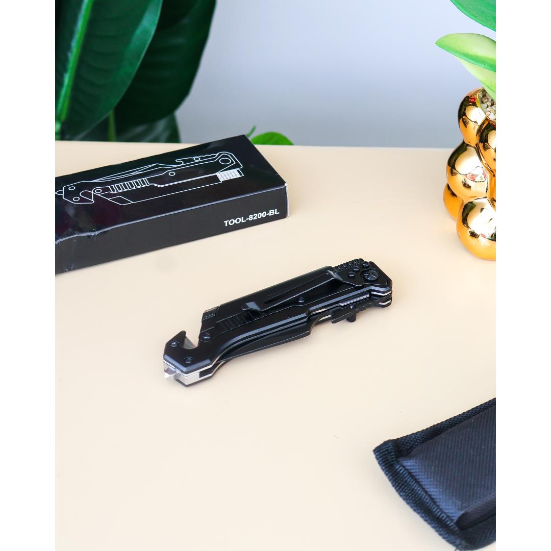 A black multi-tool pocket knife.